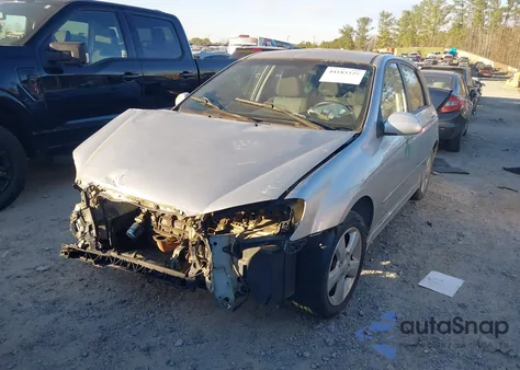 2009 Kia Spectra5 Sx from USA, damaged, VIN KNAFE241495023952